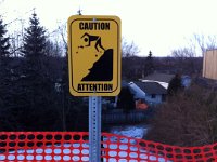 Caution sign  Aluminium sign with metal post for Tim Horton's.  Concept, design & installation